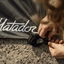 Matador Pocket Blanket 3.0 -Osprey Salgsbutikk Matador Pocket Blanket Black Lifestyle 3 2000x aa8b5310 e23e 4514 a871 3634094ad52c